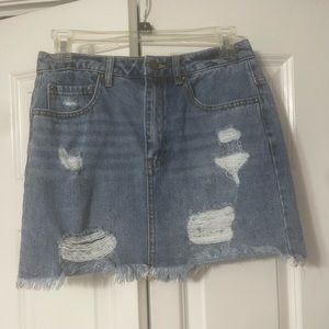 Forever 21; Jean mini skirt; size S; rips and pockets